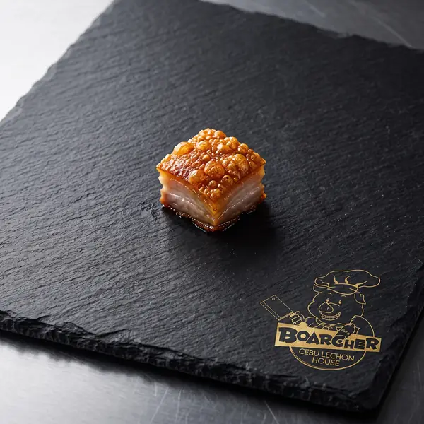 Pig chef logo on slate