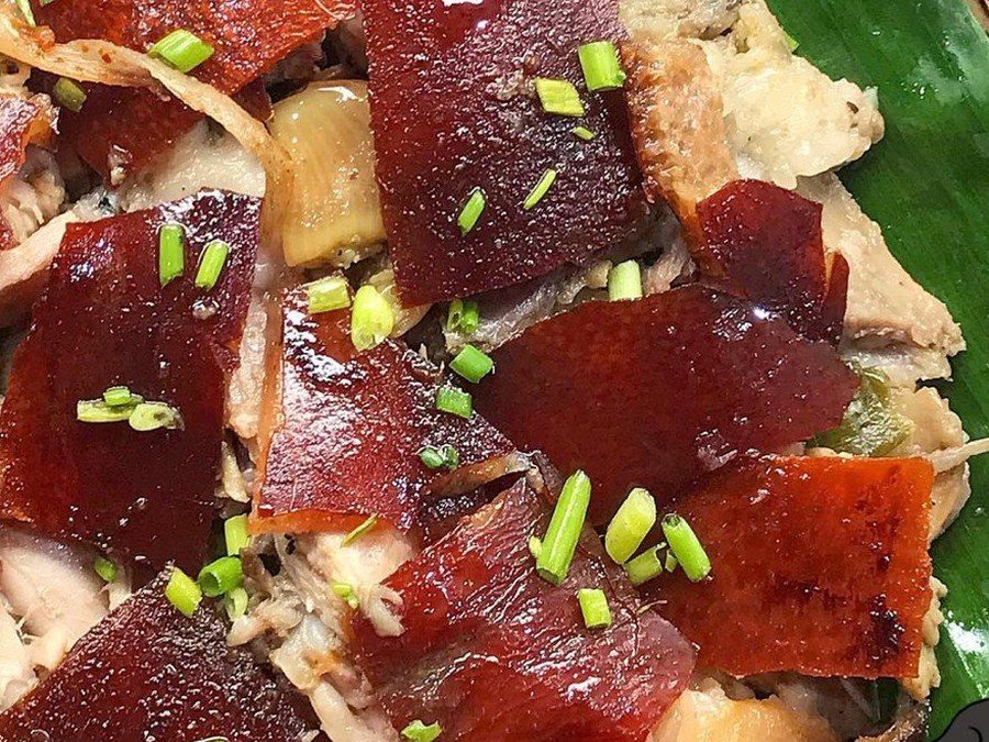 Cebu lechon served on banana leaves